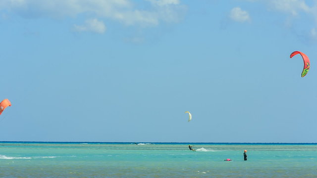 People engaged in kite surfing in the Kite Village at the Red Sea near Hamata Marine.