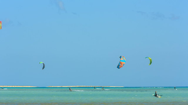 People engaged in kite surfing in the Kite Village at the Red Sea near Hamata Marine.