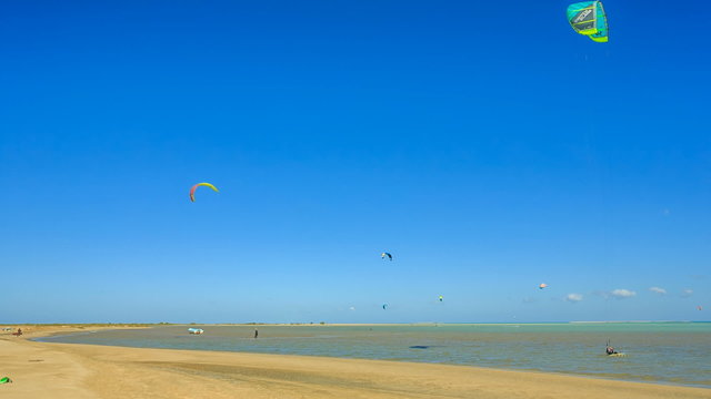 People engaged in kite surfing in the Kite Village at the Red Sea near Hamata Marine.