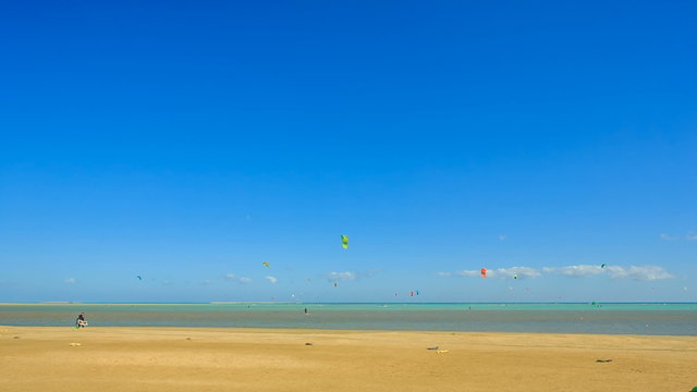 People engaged in kite surfing in the Kite Village at the Red Sea near Hamata Marine.