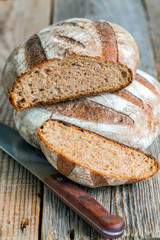 Fresh homemade bread and knife.