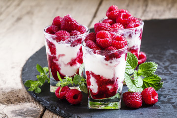 Raspberry ice cream, berries and mint, selective focus