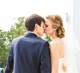 Wedding, Beautiful Romantic Bride and Groom Kissing 