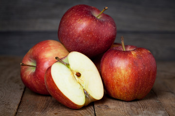 Fototapeta na wymiar Red apples on wooden background