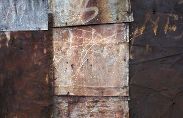 Scratched rusty grunge metal sheets, abstract industrial background