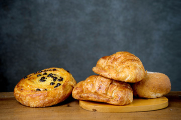croissant bakery on teak wood table