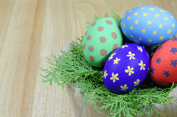 Easter eggs on wooden background
