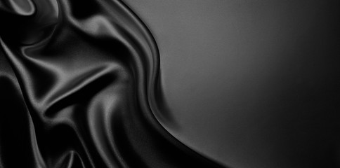 abstract background luxury cloth or liquid wave or wavy folds of grunge silk texture satin velvet...