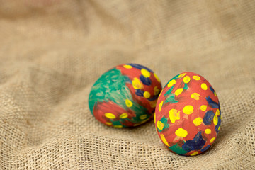 painted egg on burlap