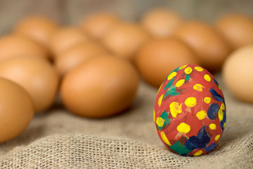painted egg on burlap