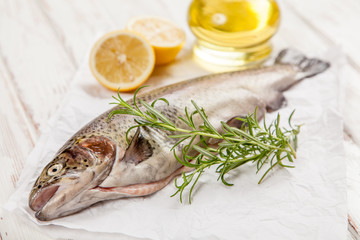 Fresh trout on white wood