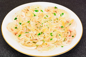 Vegetarian food: mushroom carpaccio with parmesan.