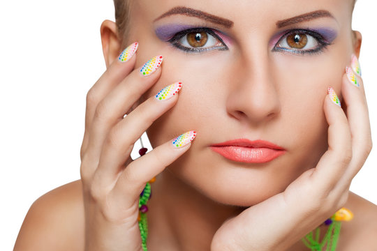 Woman beauty portrait with colorful makeup and manicure