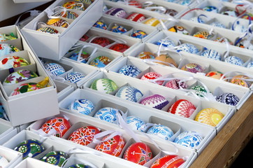 Mix of multicolored painted vivid Easter eggs on the market