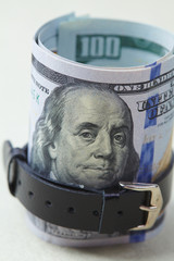 Belted role of dollars