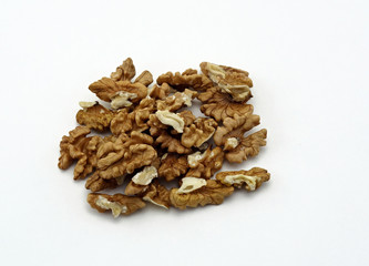 shelled walnuts on a white background