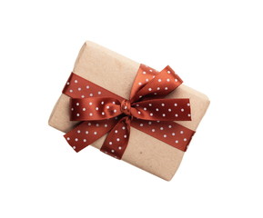 wrapped gift box with ribbon bow isolated on white