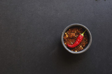 bowl with spices and hot pepper, selective focus