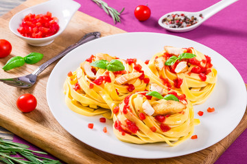 Pasta alfredo with chicken, view from above