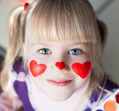 Nelli. Face, painted red hearts!