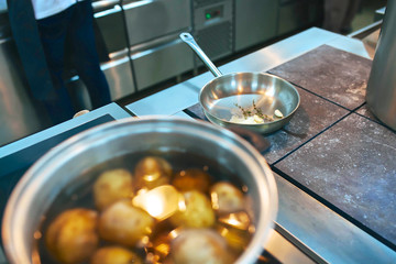 Cooking process in the pan at kitchen