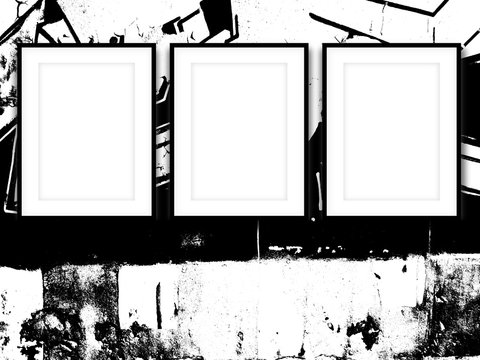 Close-up of three black picture frames on black and white ink splotchy background