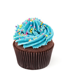 chocolate cupcake with blue buttercream isolated on white  - 104960438