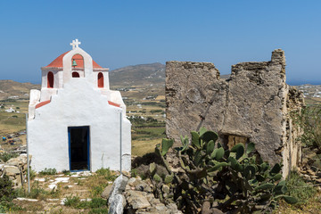 Fototapeta na wymiar The ruins of a medieval fortress and White church, Mykonos island, Cyclades, Greece
