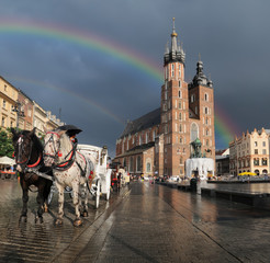 Naklejka na ściany i meble Stroll horse carriage on Main Market Square in Krakow, Poland