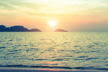 Naklejka na ściany i meble Sunset on the islands at the sea.