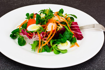 Frise Corn Salad with Chicory, Escarole, Crab Sticks and Quail E