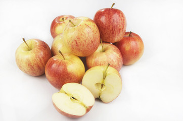 Isolated Bunch of Apples With One Cut Open On White Background