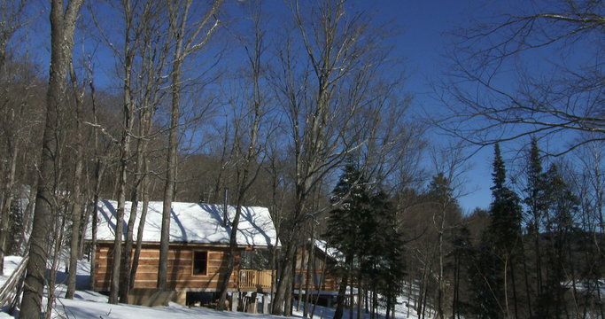 Wooden cottages in winter in Algonquin Provincial Park, Ontario, Canada
