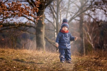 Happy caucasian child playing outdoor