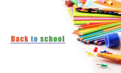 Colorful school stationery isolated on white