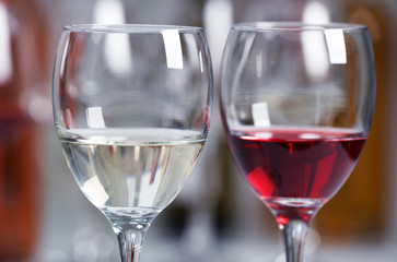 Wine glasses with red and white wine, closeup
