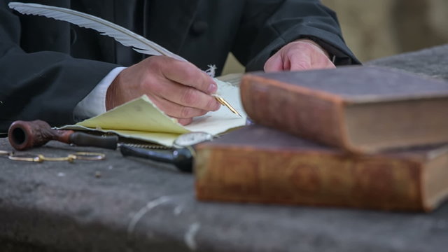 Composer starts to write a notes on piece of paper