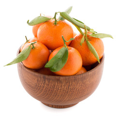 Tangerines on wooden  bowl