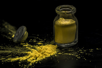 Yellow colorant powder jar