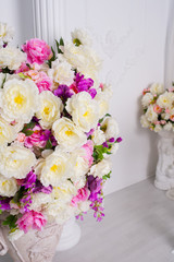 large bouquet of flowers in a vase at room