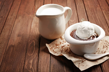 Served table of chocolate lava cake with ice-cream