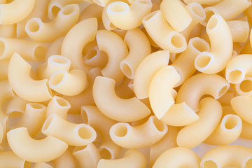 Macaroni pasta close up isolated on white