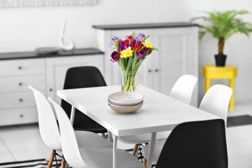 Beautiful comfortable modern interior with table and chairs