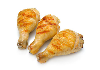 Grilled chicken legs isolated on white background