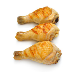 Grilled chicken legs isolated on white background