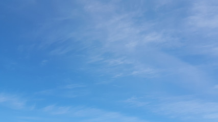 White cloudy and blue background