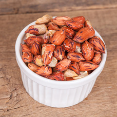 Tiger peanut in bowl on wood table