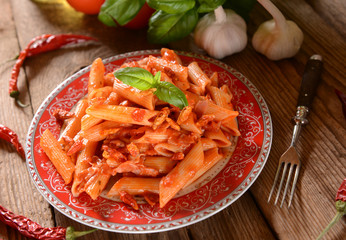 Penne pasta with hot chili sauce arrabiata