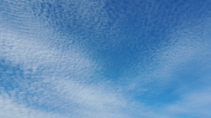 White cloudy and blue background