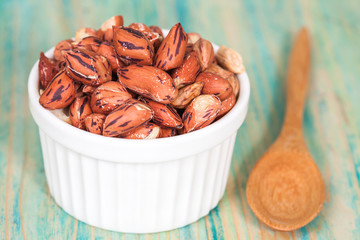 Tiger peanut in bowl on wood table